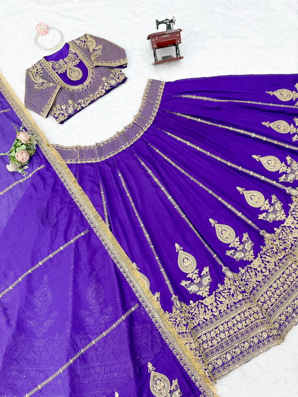 Royal Amethyst Purple Silk Lehenga Choli with Majestic Gold Zari Heritage Motifs and Elaborate Borders